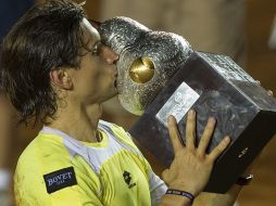 El tenista español David Ferrer celebra su victoria que lo corona en el Abierto Mexicano de Tenis en Acapulco. EFE  /