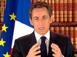 En un discurso difundido por radio y televisión, Sarkozy explicó que su objetivo es 'proteger a los franceses'. REUTERS  /