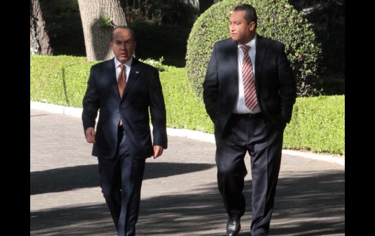 El presidente Felipe Calderón y el secretario de Gobernación, Francisco Blake Mora. ARCHIVO  /