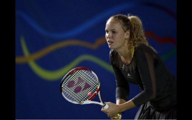 La tenista danesa, Caroline Wozniacki, no suelta el liderato de la clasificación mundial de tenis. ARCHIVO  /