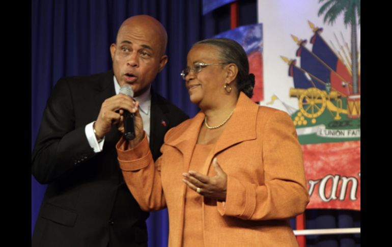 Los dos candidatos a la Presidencia de Haití Michel Martelly y Mirlande Manigat. AP  /