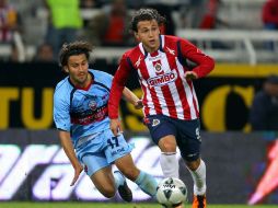 Omar Arellano y Daniel Guerrero de Atlante, durante juego de la semana 5 del Clausura 2011. MEXSPORT  /