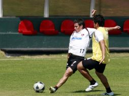 Lucas Ayala (17) dispara a portería en el entrenamiento de Atlas. MEXSPORT  /