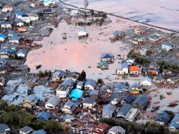 Vista aérea que muestra las casas destruidas en Iwaki tras el tsunami. EFE  /