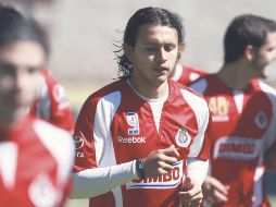 Omar Arellano (9) trota junto a sus compañeros rojiblancos durante el entrenamiento. MEXSPORT  /