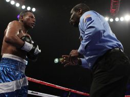 Ricardo Mayorga (izq.), quien fue severamente castigado por Miguel Cotto el sábado pasado, ya está de vuelta en Nicaragua. AFP  /