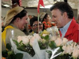 Juan Manuel Santos, celebra decisión de Hugo Chávez. ARCHIVO  /