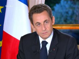 El presidente francés Nicolás Sarkozy  negó que el líder líbio haya financiado su campaña electoral. ARCHIVO  /