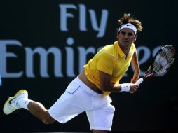 Roger Federer en pleno juego con Stanislas Wawrinka en Indian Wells. EFE  /