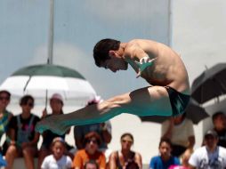 El mexicano Rommel Pacheco ejecuta uno de sus clavados desde la plataforma de 10 metros. MEXSPORT  /