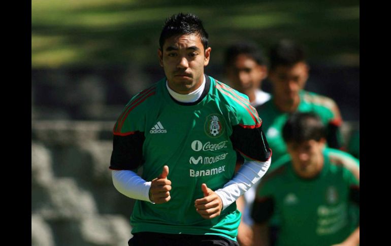 Marco Fabián realiza ejercicios físicos durante la sesión de práctica del Tricolor juvenil. MEXSPORT  /