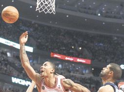 Derrick Rose (1), el motor de los Bulls de Chicago, anotó ayer 24 puntos ante los Grizzlies de Memphis. AP  /