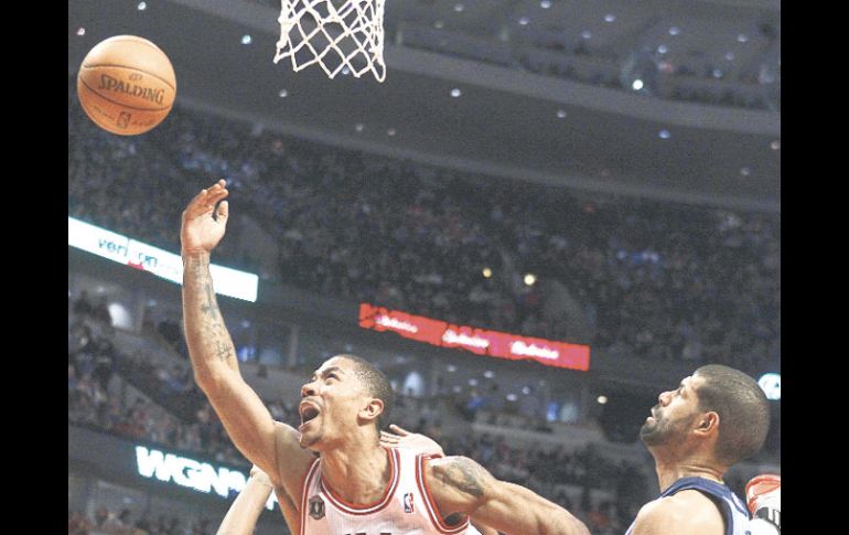 Derrick Rose (1), el motor de los Bulls de Chicago, anotó ayer 24 puntos ante los Grizzlies de Memphis. AP  /