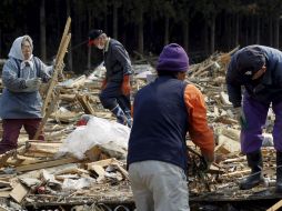 Cerca de 200 mil personas siguen refugiadas en mil 900 centros de evacuación a raíz del desastre. EFE  /