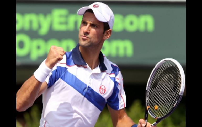 Novak Djokovic, celebra su triunfo ante el norteamericano, Mardy Fish. AFP  /