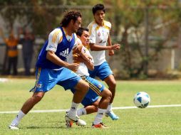 Los jugadores de Tigres se preparan para enfrentarse al Atlante. MEXSPORT  /