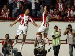 Integrantes del Necaxa celebrando una anotación. MEXSPORT  /