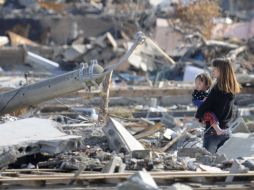 La alerta fue breve pues la Agencia Meteorológica de Japón descarta nuevo tsunami. AP  /