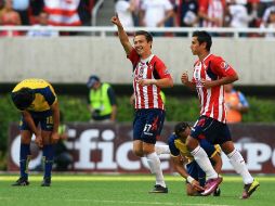 Erick 'Cubo' Torres celebra tras marcar ante el América durante el Clásico llevado a cabo ayer en el Omnilife. MEXSPORT  /