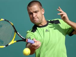 El tenista ruso Mikhaik Youzhny, décimo cabeza de serie, fue sorprendido en la primera ronda del torneo por Florian Mayer. EFE  /