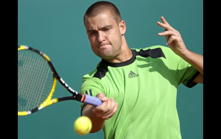 El tenista ruso Mikhaik Youzhny, décimo cabeza de serie, fue sorprendido en la primera ronda del torneo por Florian Mayer. EFE  /