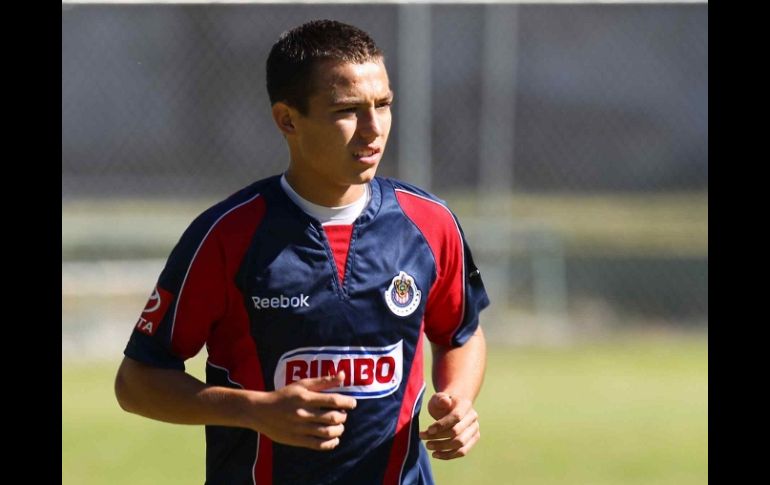 Erick Torres durante un entrenamiento con el Rebaño Sagrado. MEXSPORT  /