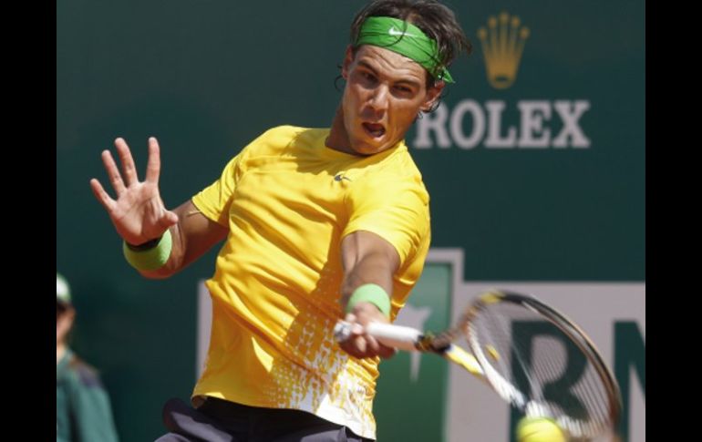 Rafael Nadal devolviendo la pelota a su contrincante Nieminen. AFP  /