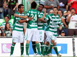 Daniel Ludueña festeja con su equipo la anotación de esta tarde frente al Puebla. MEXSPORT  /