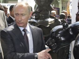 Vladimir Putin se convirtió en presidente del partido, un cargo que usa como fuente e instrumento de poder. ARCHIVO  /