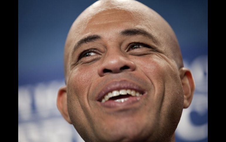 Michel Martelly se encuentra desde el martes de visita en Estados Unidos. AFP  /