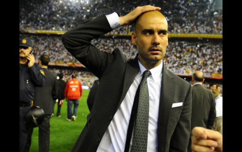 Joseph Guardiola durante el partido ante Real Madrid en la final de la Copa Rey. AP  /