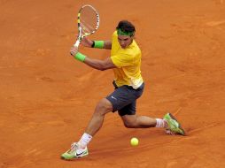 Nadal (foto) venció a Monfils por octava vez, ésta última al conseguir cinco de nueve bolas de partido. AFP  /