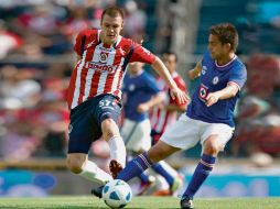 Guadalajara no supo ganarle al Cruz Azul, que empata en la recta final del partido. MEXSPORT  /