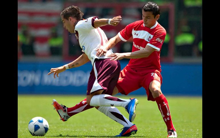 Mario Mendez (der.) está molesto por el empate ante Estudiantes y sabe que el partido contra Atlante no será sencillo. MEXSPORT  /