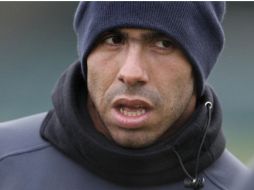 Carlos Tévez trabaja duro para lograr superar su lesión. ARCHIVO  /