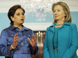 Encabezan la reunión Patricia Espinosa, canciller mexicana (izq.), y su par estadounidense Hillary Clinton (der.). AFP  /