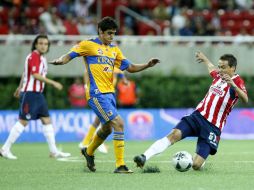 Chivas y Tigres solamente se han enfrentado en una ocasión en series por el título del futbol mexicano. ARCHIVO  /