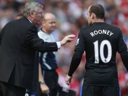 Alex Ferguson dando instruciones a Wayne Rooney en el pasado enfrentamiento ante el Arsenal. REUTERS  /