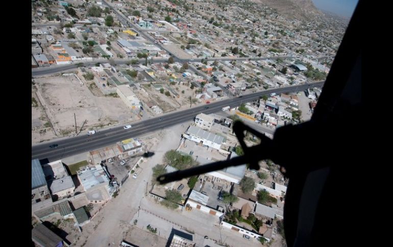 Policía federal sobrevuela Juárez. El vocero de seguridad dice que los asesinatos en esta ciudad se redujeron. ARCHIVO  /