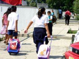 En Ciudad Juárez, sólo cinco mil de  los 25 mil niños que salen de primaria en junio continuarán estudiando. ARCHIVO  /