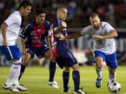 Las acciones del partido en Cancún fueron muy cerradas en todo momento. MEXSPORT  /