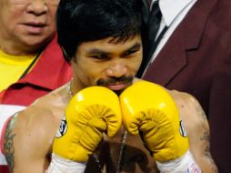 Manny Pacquiao antes de comenzar la pelea para retener su título welter de la OMB. AFP  /