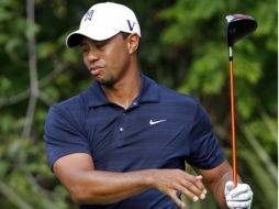 Tiger Woods aseguró que tiene problemas para caminar por lo que se retiró del torneo. REUTERS  /