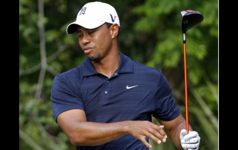 Tiger Woods aseguró que tiene problemas para caminar por lo que se retiró del torneo. REUTERS  /