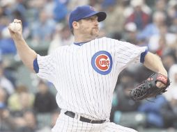 Ryan Dempster, lanzador abridor de los Cachorros de Chicago, abanicó a 11 rivales. AP  /