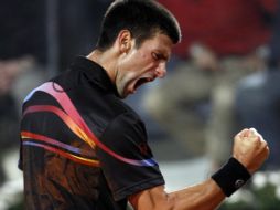 Novak Djokovic festeja tras vencer a Murray durante el partido de semifinales. REUTERS  /