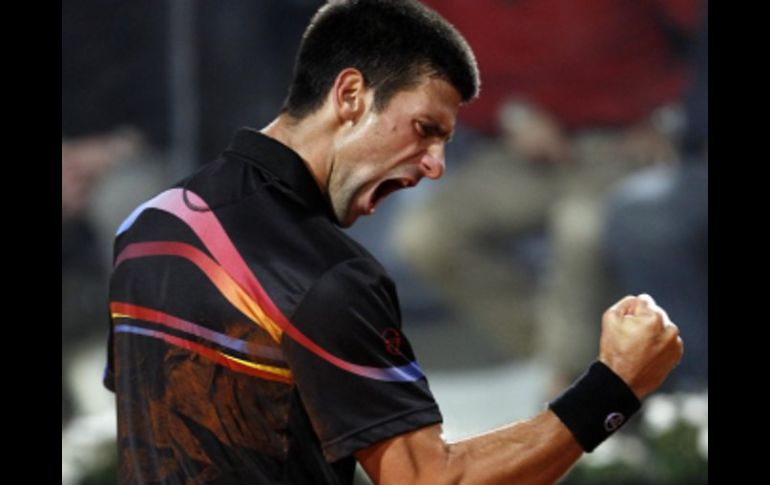 Novak Djokovic festeja tras vencer a Murray durante el partido de semifinales. REUTERS  /