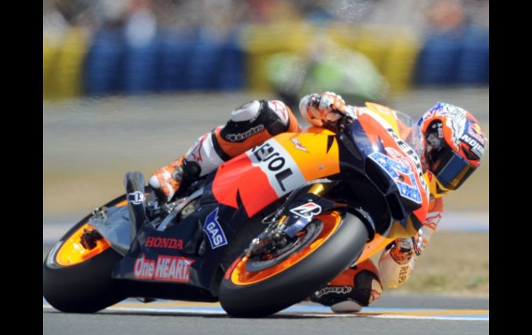 El piloto australiano, Casey Stoner, durante la carrera de clasificación para el GP Francia. AFP  /