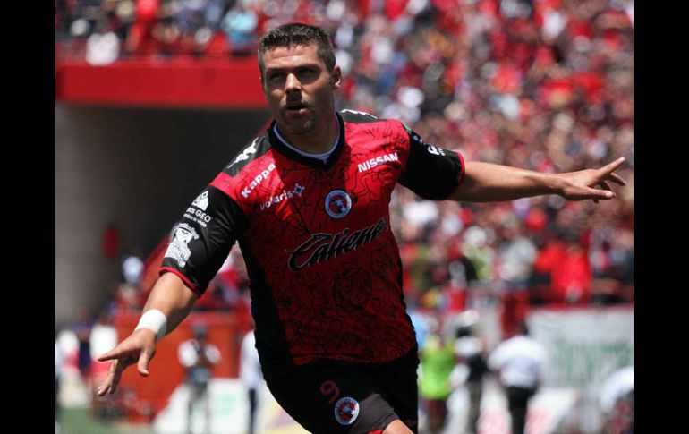 Mauro Gerk de Tijuana celebra tras marcar gol ante Irapuato. MEXSPORT  /