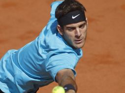 Juan Martín del Potro devuelve la pelota a su contrincante Ivo Karlovic. AP  /